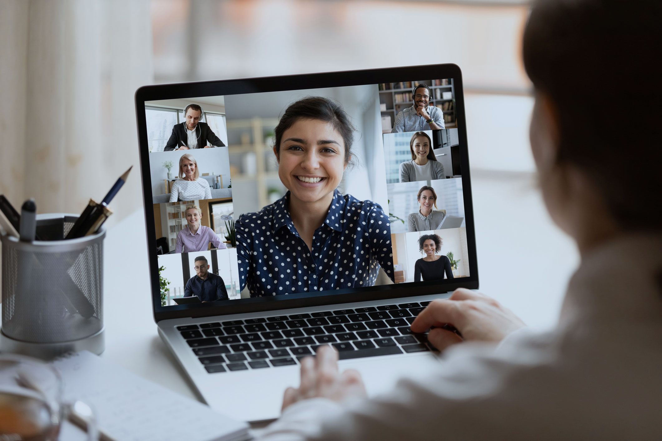 Smiling participants on a webinar
